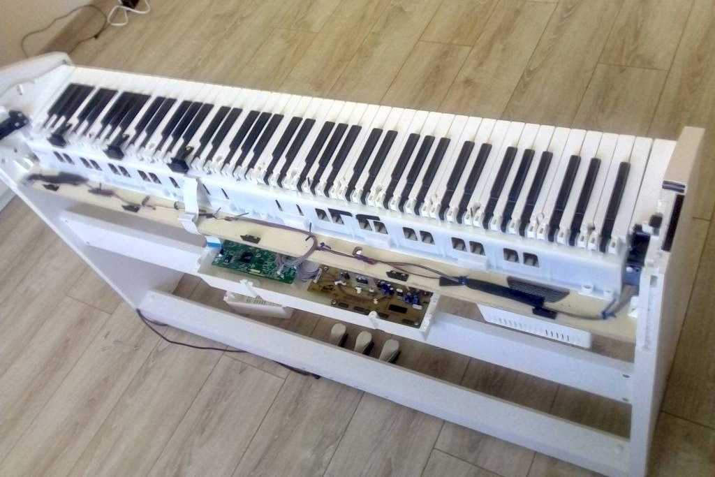 Клавишный механизм пианино